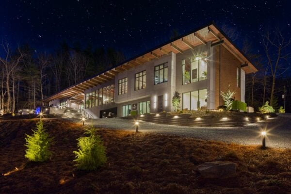 Tender design features home by Chip Wade Exterior At Dusk