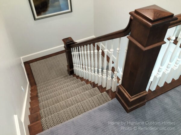 Textured Carpet Transition To Gray Herringbone Stair Runner Rug On A White And Dark Wood Staircase, Remodelaholic UV16 H34